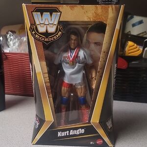 Mattel WWE Legends Kurt Angle Figure with Red, Blue, and Gold Details